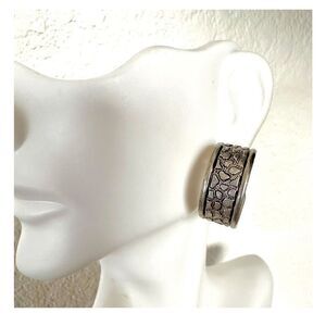 Silver tone hoop earrings
